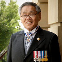 Photo of The Honourable Norman L. Kwong