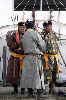Russian boots also worn in Monolia - picture of three men at Naadam Festival